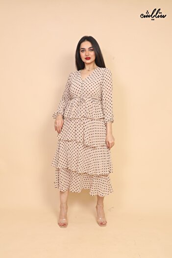 Stylish Ultra-chic midi dress with a modern layered cut and polka dot style.
