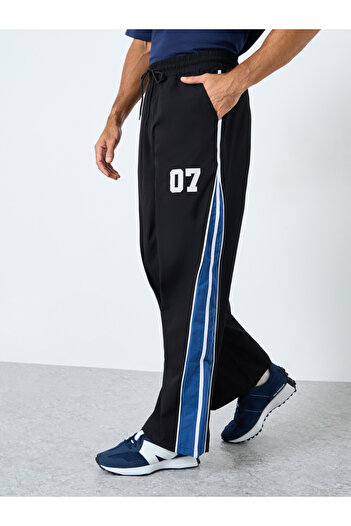 Styli Oversized Fit Cut and Sew Detail Parachute Pant