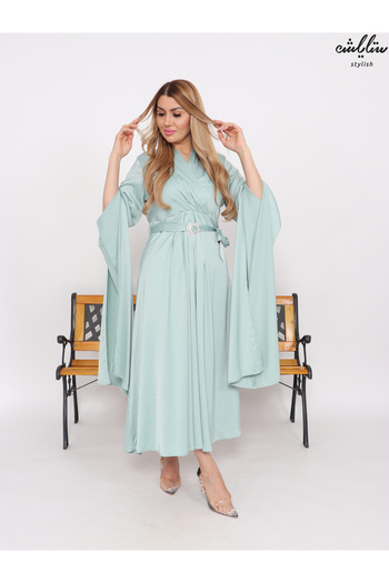 Stylish Pistachio midi dress with wrap design and elegant sleeves