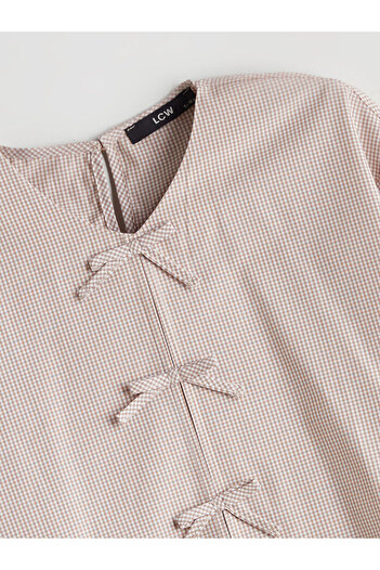 LC Waikiki Peak New Season Μπλούζα για κορίτσια με λεπτομέρεια με φιόγκο με λαιμόκοψη σε σχήμα V