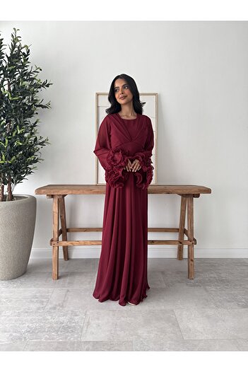 Generic Elegant long burgundy dress with a soft design and sheer sleeves decorated with roses
