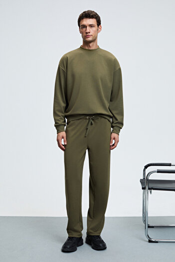 GRIMELANGE Griffin Men's Khaki Sweatpants with Elastic Waistband and Metal Bird's Eye Detail