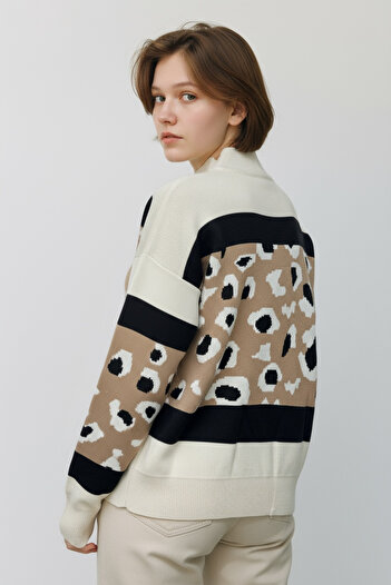 NEWCO Half-High Neck Patterned Knit Sweater with a Comfortable Fit.