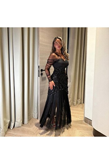 FAYD AL-JAWRI Satin long black evening dress with sheer sleeves and embroidery with fringe