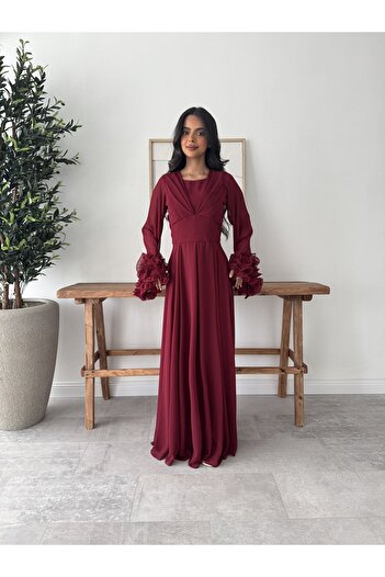 Generic Elegant long burgundy dress with a soft design and sheer sleeves decorated with roses
