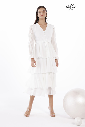 Stylish White maxi dress with a layered cut for a soft, feminine look.
