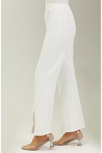 sefamerve White slit-hem trousers with cuffed legs 3028-01