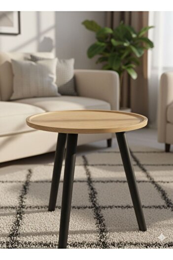 MOSTAFA Round wooden table with a modern and elegant design