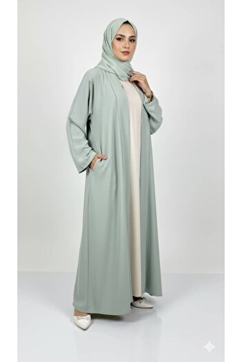 REİNA Elegant light green linen abaya with matte gold accessories