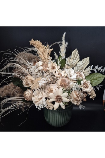 Yellow Tulip Boho arrangement in a bowl with sola flowers, dried and cryogenic plants