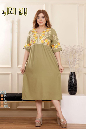 Lyaly aljlabyh Short "Olive and Spice" jalabiya from Layali Jalabiya, bohemian design with colorful folkloric embroidery.