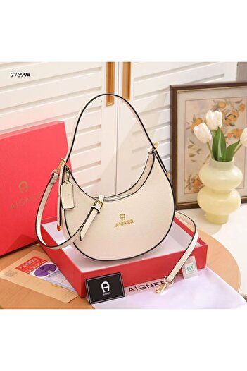 style iconic Luxury Half-Moon Shoulder Bag – Elegant PU Leather Handbag