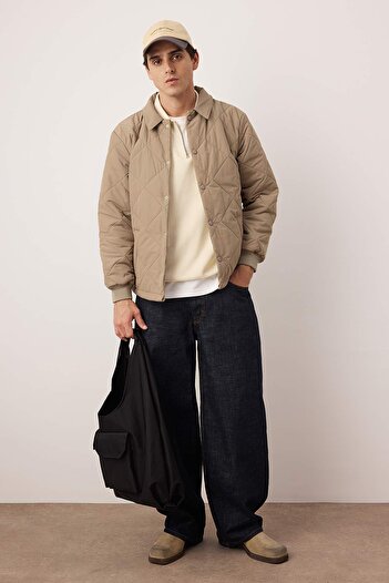 Trendyol Collection Μπεζ καπιτονέ καπιτονέ Unisex χειμερινό παλτό TMNAW26MO00017