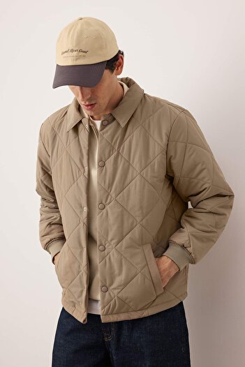 Trendyol Collection Μπεζ καπιτονέ καπιτονέ Unisex χειμερινό παλτό TMNAW26MO00017