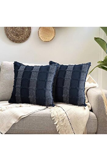 Generic Square pillow with an interlocking check design.