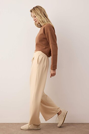 Trendyol Collection Taş Wide Leg Soft Fabric Pleated Stretchy Knitted Trousers Twoaw26Pl00138