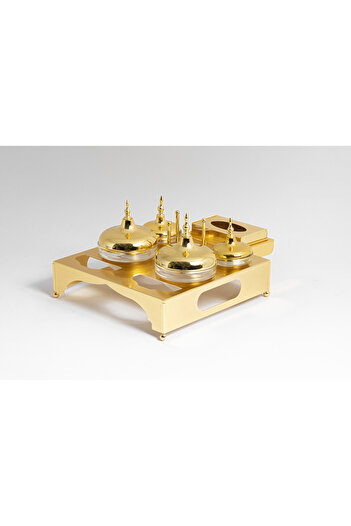 Bin Shihoun 6-piece golden date hospitality set with a golden napkin holder