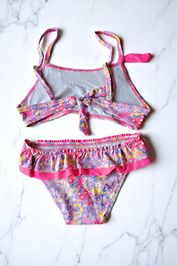 embody Girls 2 piece swimsuit with pink ruffles