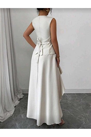 RANO-BOUTİQUE Women's two-piece set, featuring a slit skirt with a patterned design and a sleeveless jacket