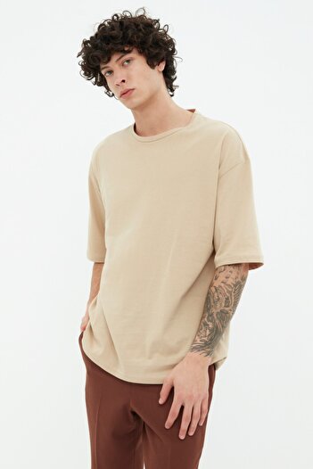 Trendyol Collection Béžové bavlněné tričko oversize s potiskem - TMNSS21TS2037