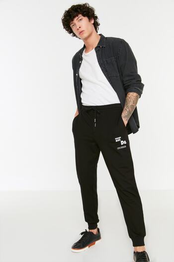 Trendyol Collection TExt PrintEd Black SwEAtPants - Regular Cut, RubbEr LEg TMNSS22EA0150
