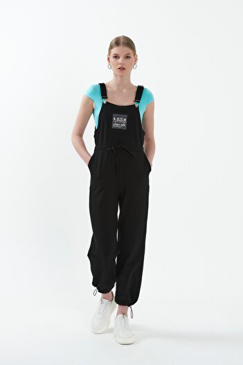 WESTBRAND Lace-up Jumpsuit with Front Accessories