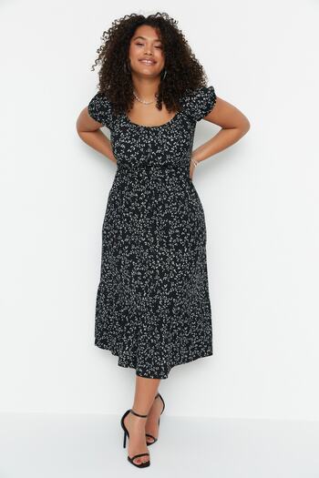 Trendyol Curve Schwarzes, bodenlanges, gestricktes Kleid in A-Linie mit Blumendruck in Übergröße TBBSS22AH00009