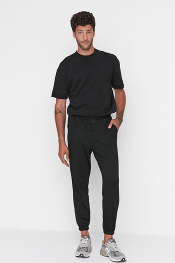Trendyol Collection Μαύρο φαρδύ παντελόνι φούτερ με φαρδιά εφαρμογή TMNAW22EA0160
