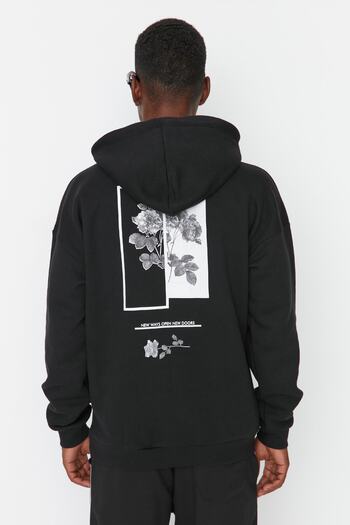 Trendyol Collection Schwarzes Fleece-Sweatshirt mit Blumendruck - Übergroße Kapuze TMNAW22sw1651