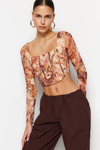 Trendyol Collection Premium Orange Back Transparent Printed Lined Crop Tulle Stretchy Knitted Blouse TWOSS23BZ00395