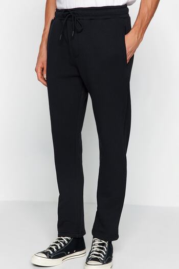 Trendyol Collection Μαύρο βαμβακερό παντελόνι με ανοιχτό πόδι - κανονική εφαρμογή TMNAW24EA00011