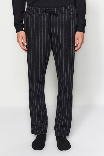 Trendyol Collection Černé pruhované unisex pyžamové kalhoty Regular Fit - TMNAW24PJ00001