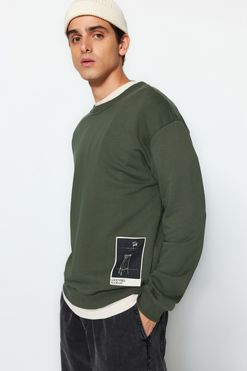 Trendyol Collection Khaki Oversize/Wide Cut Crew Neck Art Themed Appliqued Unshaded Sweatshirt Tmnaw24Sw00038