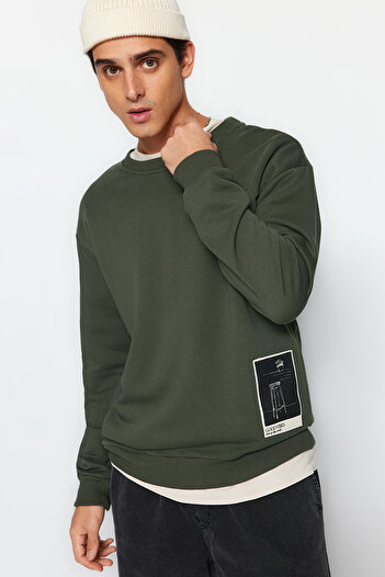 Trendyol Collection Khaki Oversize/Wide Cut Crew Neck Art Themed Appliqued Unshaded Sweatshirt Tmnaw24Sw00038