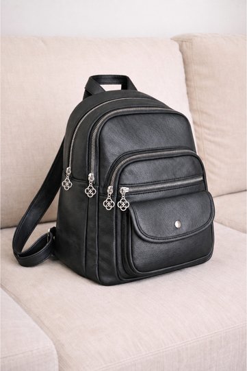Women's Black Medium Size Multi-Compartment Leather Backpack – Stylish Design with Large Volume and Zipper for Daily Use
