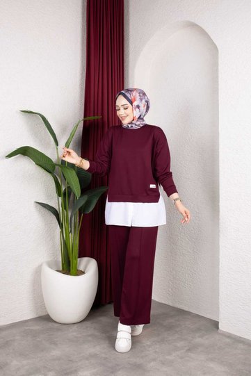 طقم نسائي مكون من قطعتين، سويت شيرت كبير الحجم وبنطلون واسع الساق، مزيج أنيق للاستخدام اليومي