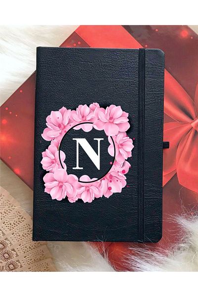 mooodcase دفتر أسود بحرف N وزهور