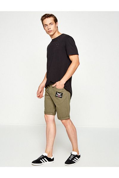 Koton Grüne Shorts mit Wappen für Damen