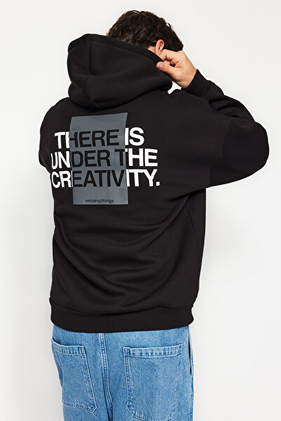 Trendyol Collection Μαύρο 100% βαμβάκι Oversize/Φαρδιά κουκούλα με μακρυμάνικο πίσω γράμμα εμπριμέ φούτερ TMNAW24SW00220