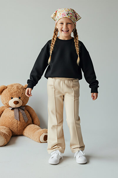 TRENDYOLKIDS Μπεζ κοριτσίστικο παντελόνι - εποχιακό, λεπτό φαρδύ πόδι, λεπτομέρεια με ραβδώσεις Tkdaw25ea00003