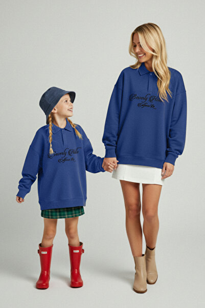 TRENDYOLKIDS Navy Blue Cotton Slogan Printed Polo Collar Off Shoulder Knitted Girl's Sweatshirt Tkdaw26Sw00009
