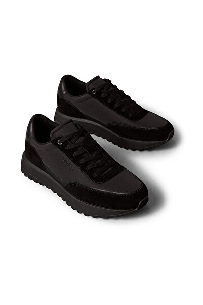 Calvin Klein حذاء رياضي رجالي من الجلد منخفض الرقبة برباط من شركة Repreve باللون الأسود الثلاثي