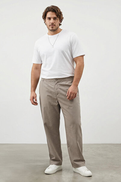Trendyol Collection Spodnie sezonowe z tkaniny Stone Color Paper Touch w duży...
