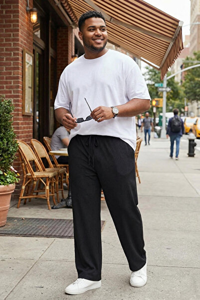 ترينديول كوليكشن بنطال صيفي أسود كبير الحجم واسع الساق TMNSS25AR00000