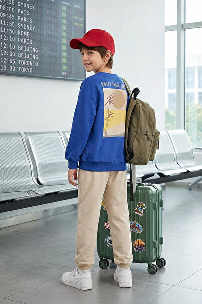 TRENDYOLKIDS طقم سترة وبنطلون رياضي منسوج من القطن المطبوع للأولاد من ساكس TK...