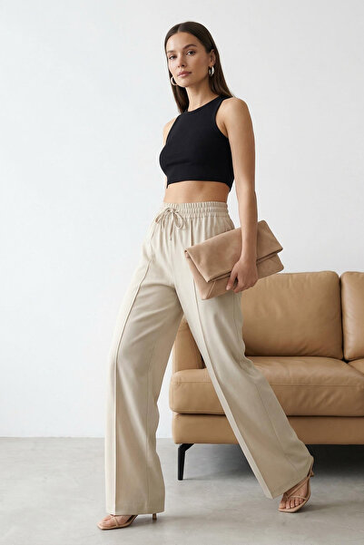 Trendyol Collection Steinrippige, weit geschnittene, lange Webhose TWOAW26PL0...