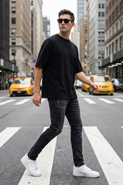 Trendyol Collection Schwarze Skinny Slim-Fit-Jeans mit Stretch-Stoff und Nagelabnutzung TMNAW20JE0250