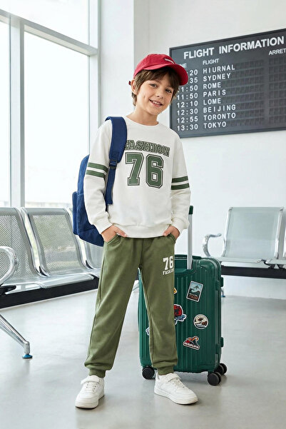 TRENDYOLKIDS Ecru Boy Slogan Baumwolle gestricktes Oberteil und Unterteil TKD...