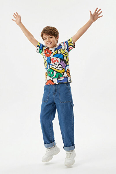 TRENDYOLKIDS بنطال جينز للأولاد بخصر عالٍ - أزرق متوسط، 100% قطن، مقاس عادي T...