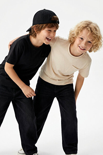 TRENDYOLKIDS تي شيرت أسود وأبيض للأولاد مصنوع من القطن بنسبة 100% بأكمام قصيرة